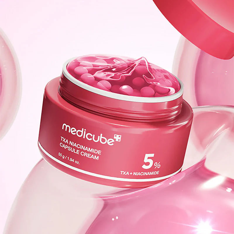 Boião TXA Niacinamide Capsule Cream aberto, com gel e cápsulas visíveis no interior