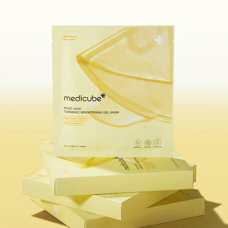 Caixa e saqueta da máscara Medicube Kojic Acid Turmeric empilhadas