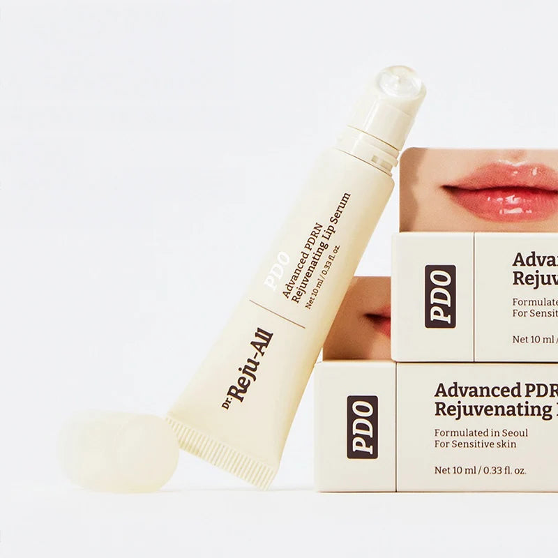 Sérum labial Dr. Reju-All com embalagem exterior, tubo e caixa bege