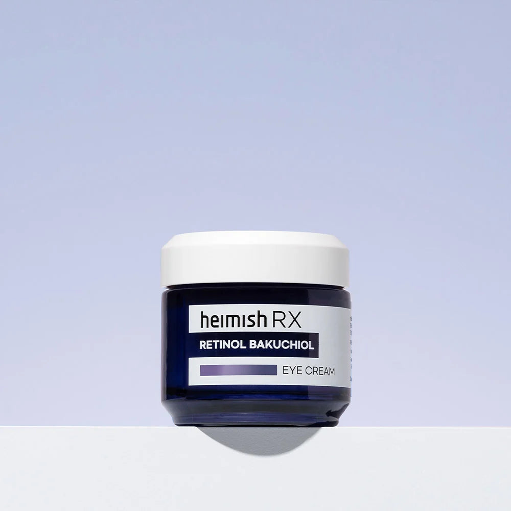 Heimish RX Retinol Bakuchiol Eye Cream, embalagem em vidro azul escuro sobre fundo lilás