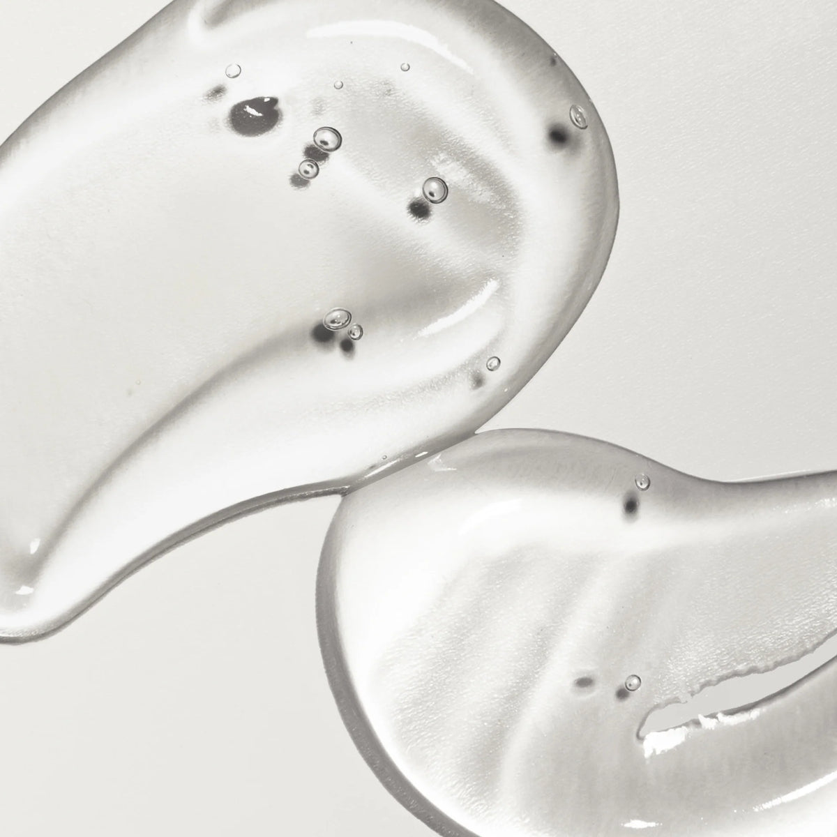 Textura em gel transparente do sérum Haruharu Wonder Centella TXA, com bolhas