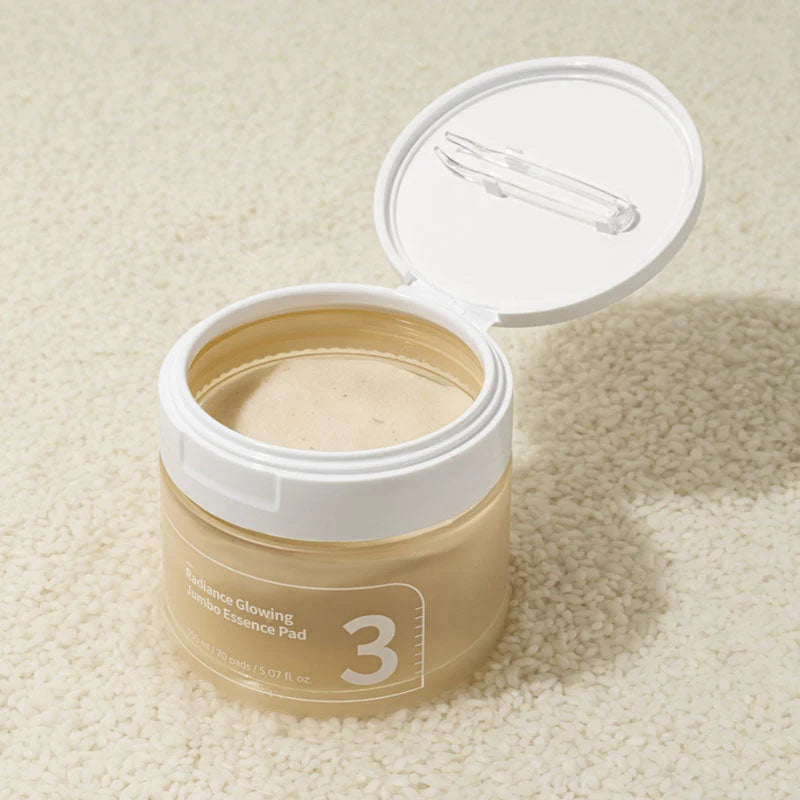 Frasco aberto do numbuzin No.3 Essence Pad com disco visível no interior