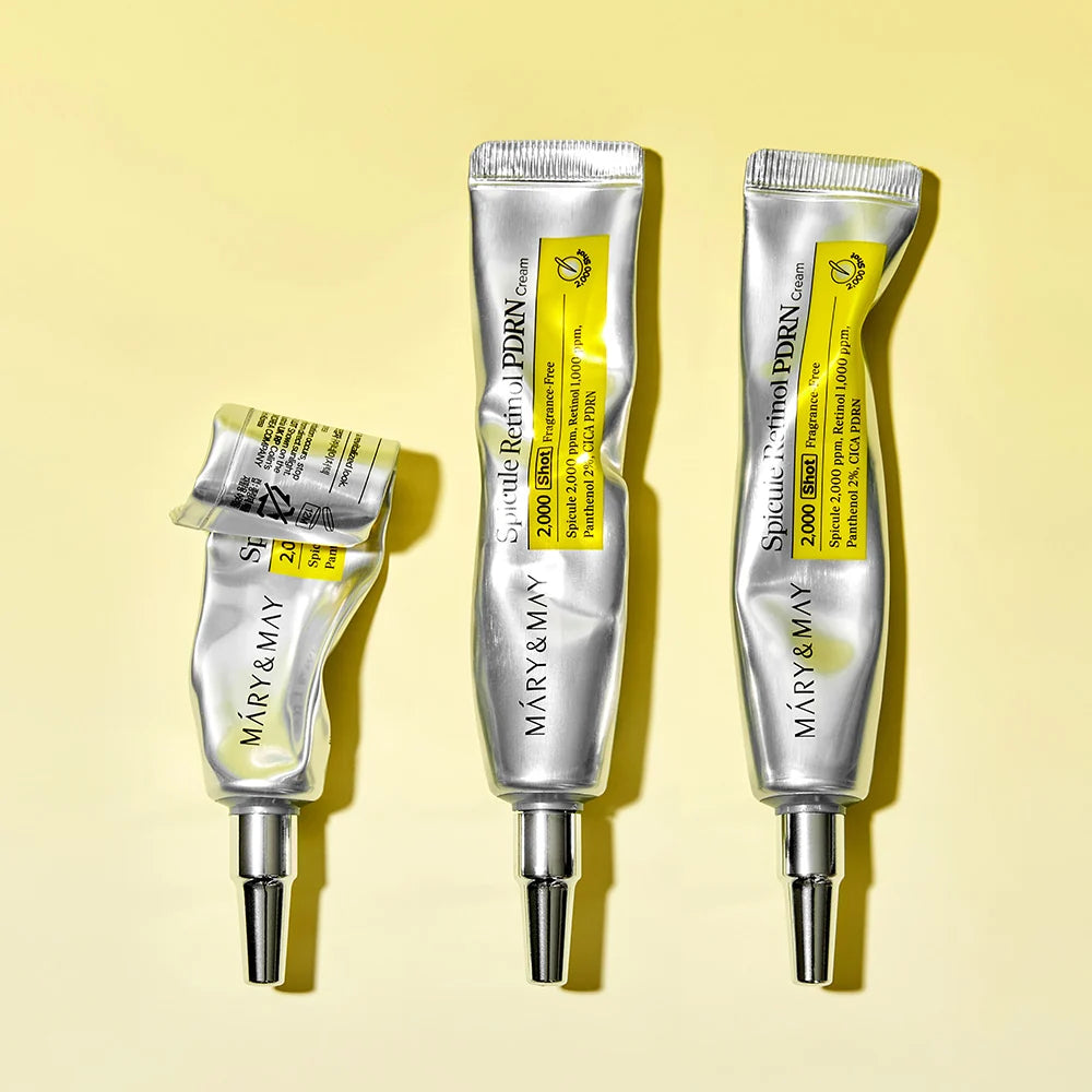 Três tubos do Spicule Retinol PDRN Cream, um deles já utilizado
