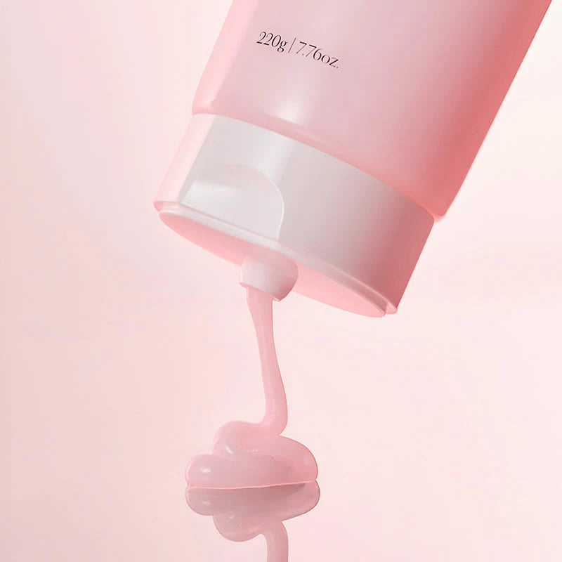 Creme rosa a escorrer da abertura do tubo Growus Damage Therapy Treatment EX