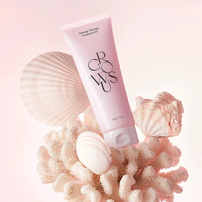 Tubo Growus Damage Therapy Treatment EX apoiado em conchas e coral, estética marinha