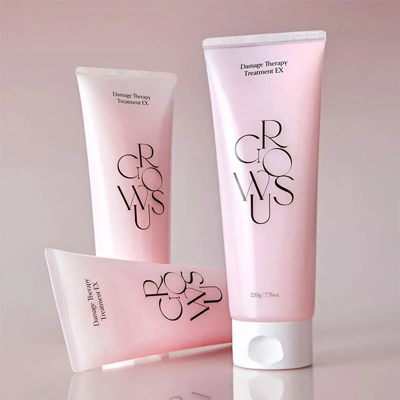 Três tubos do Growus Damage Therapy Treatment EX em diferentes ângulos, fundo rosa