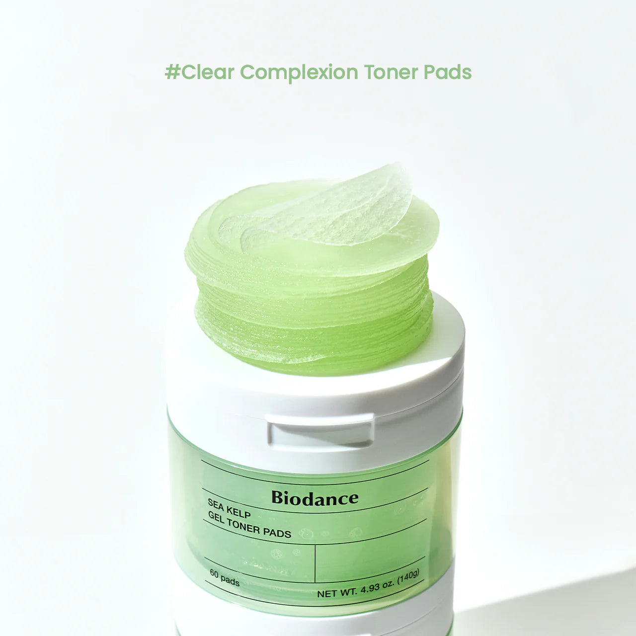 Biodance Sea Kelp Gel Toner Pads embalagem aberta pads em gel verde empilhados textura gel