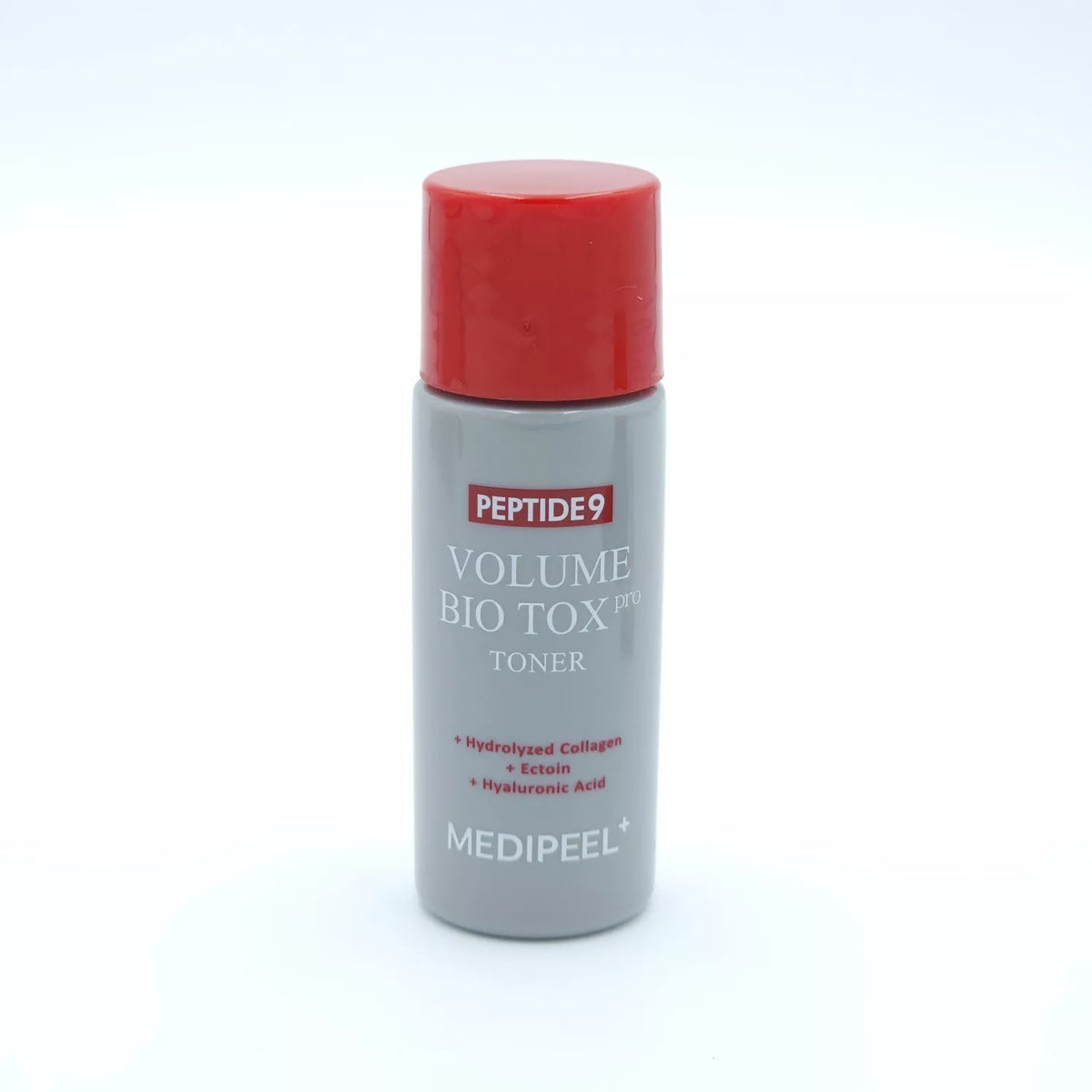 Frasco do tónico Volume Bio Tox Pro com tampa vermelha e colagénio hidrolisado no rótulo